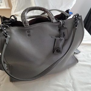 Preowned Coach Rogue 30 Gray with Snakeskin detail with dust bag.